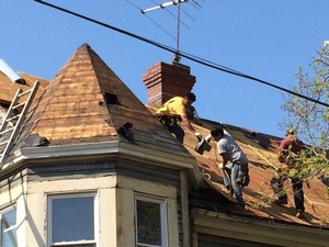 example of a five sided turret roof being replaced by J-Built